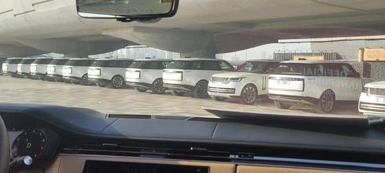 The official Dubai World Cup transport fleet of white Range Rovers lined up before service